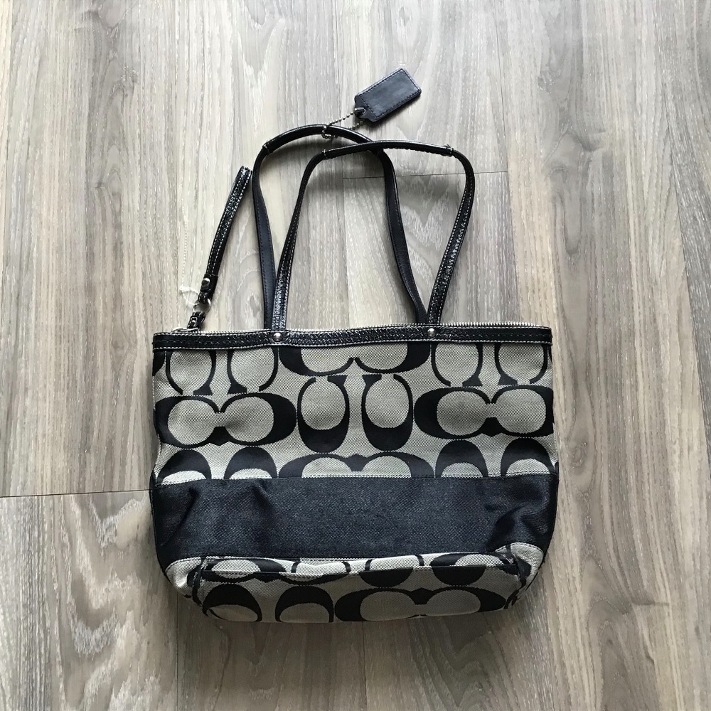Coach purse Carryall in Signature Canvas and Leather Trim